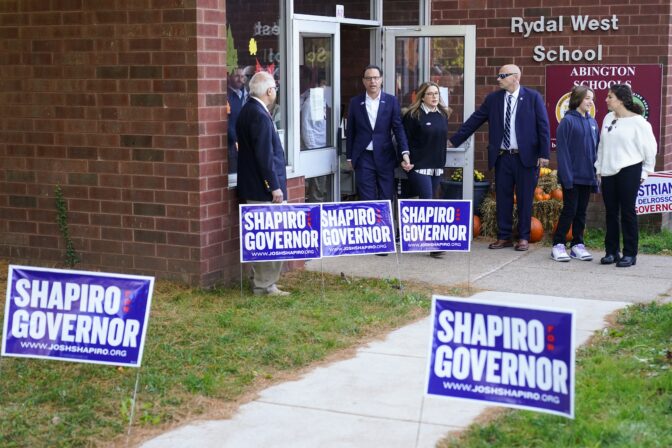 Pennsylvania gubernatorial candidate state Attorney General Josh Shapiro, accompanied by his Lori Shapiro, departs after casting his ballot in the midterm elections in Rydal , Pa., Tuesday, Nov. 8, 2022.