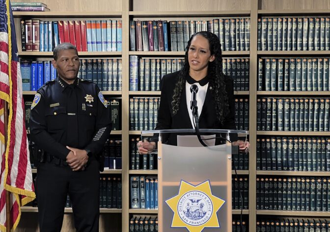 San Francisco District Attorney Brooke Jenkins addresses reporters at a news conference with Police Chief William Scott standing next to her on Monday, Oct. 31, 2022, in San Francisco.