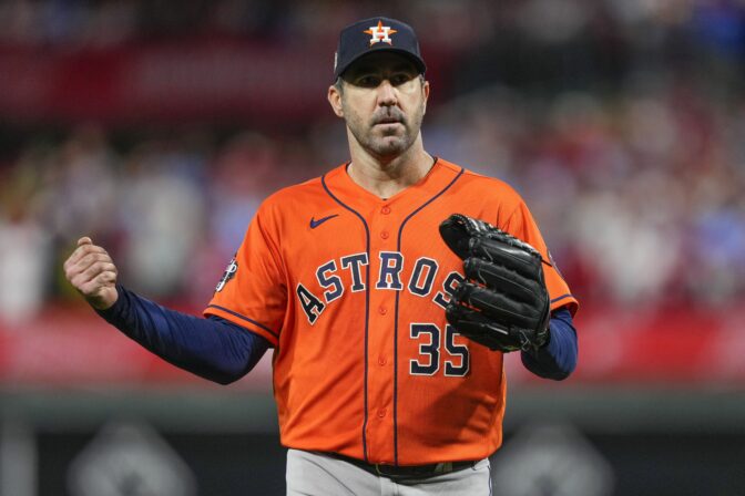 Houston Astros starting pitcher Justin Verlander celebrates the last out in the fifth inning in Game 5 of baseball's World Series between the Houston Astros and the Philadelphia Phillies on Thursday, Nov. 3, 2022, in Philadelphia.