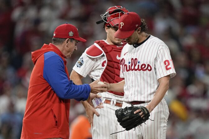 Philadelphia Phillies starting pitcher Aaron Nola leaves the game with bases loaded during the fifth inning in Game 4 of baseball's World Series between the Houston Astros and the Philadelphia Phillies on Wednesday, Nov. 2, 2022, in Philadelphia.