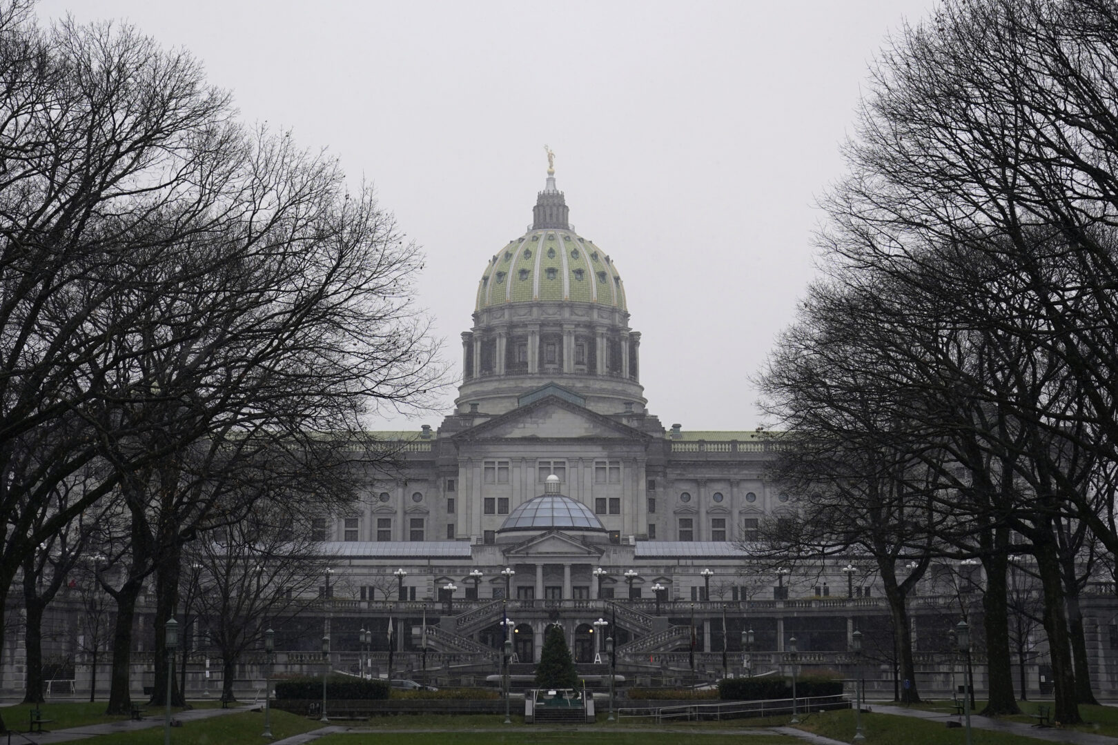 FILE - The Pennsylvania state Capitol is seen on Dec. 14, 2020, in Harrisburg, Pa. Pennsylvania's statewide elections agency said in a court filing Friday, Dec. 16, 2022, that it is moving ahead with plans for special elections to fill three House vacancies in early February unless a court orders otherwise. 