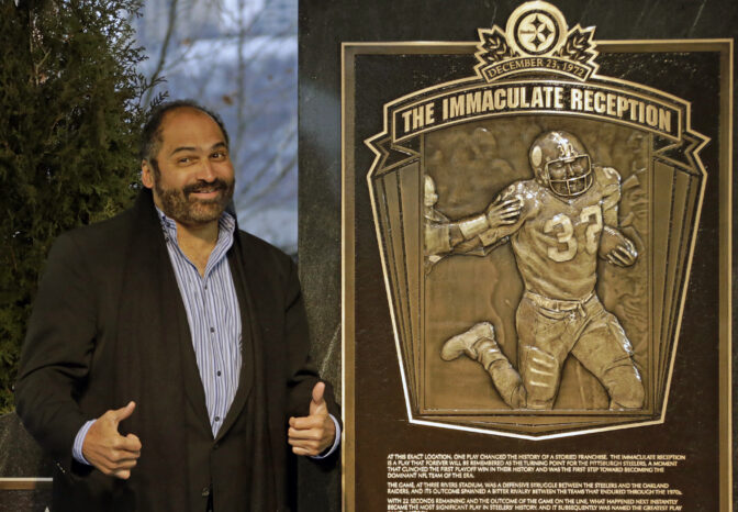 Hall of Fame running back, Pittsburgh Steelers' Franco Harris stands on the spot of the "Immaculate Reception"