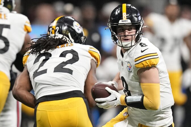 Pittsburgh Steelers quarterback Kenny Pickett (8) works against the Atlanta Falcons during the first half of an NFL football game, Sunday, Dec. 4, 2022, in Atlanta.