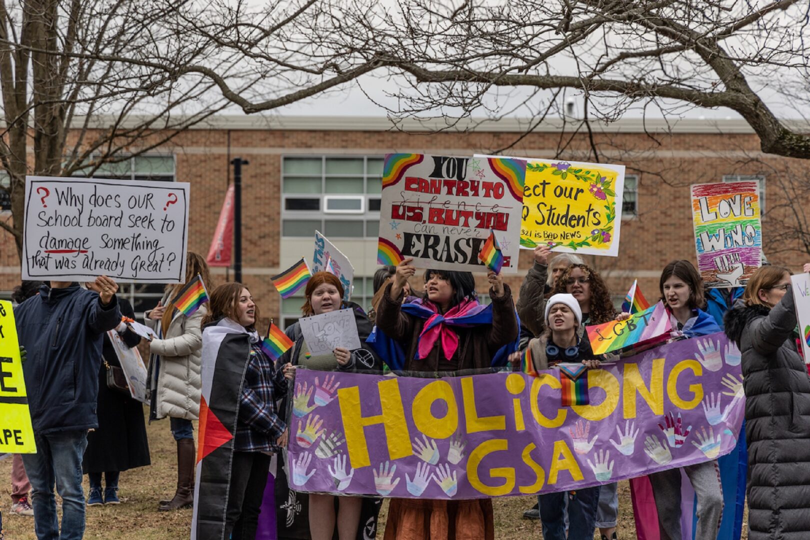 Students from Holicong Elementary School’s GSA protested policy 321, which bans teachers in the Central Bucks School District from displaying materials not related to curriculum, like the rainbow Pride flag, outside a community town hall on January 17, 2023. 