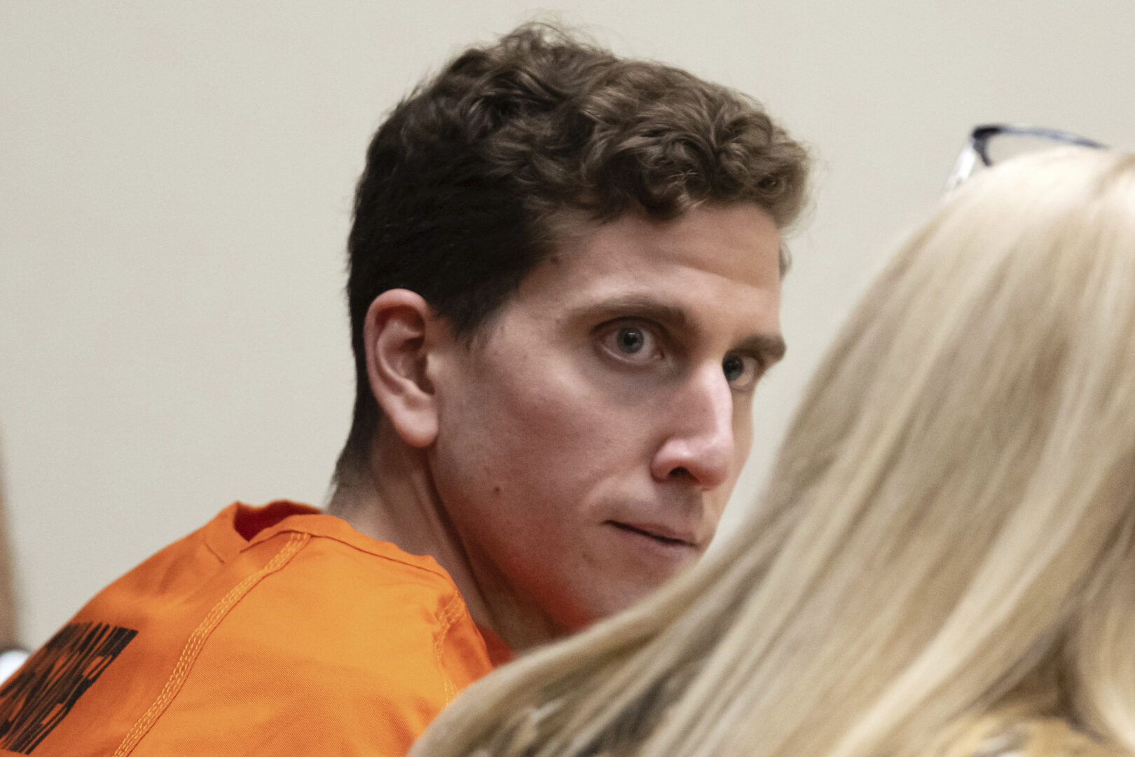 Bryan Kohberger, left, who is accused of killing four University of Idaho students in November 2022, looks toward his attorney, public defender Anne Taylor, right, during a hearing in Latah County District Court, Thursday, Jan. 5, 2023, in Moscow, Idaho. 