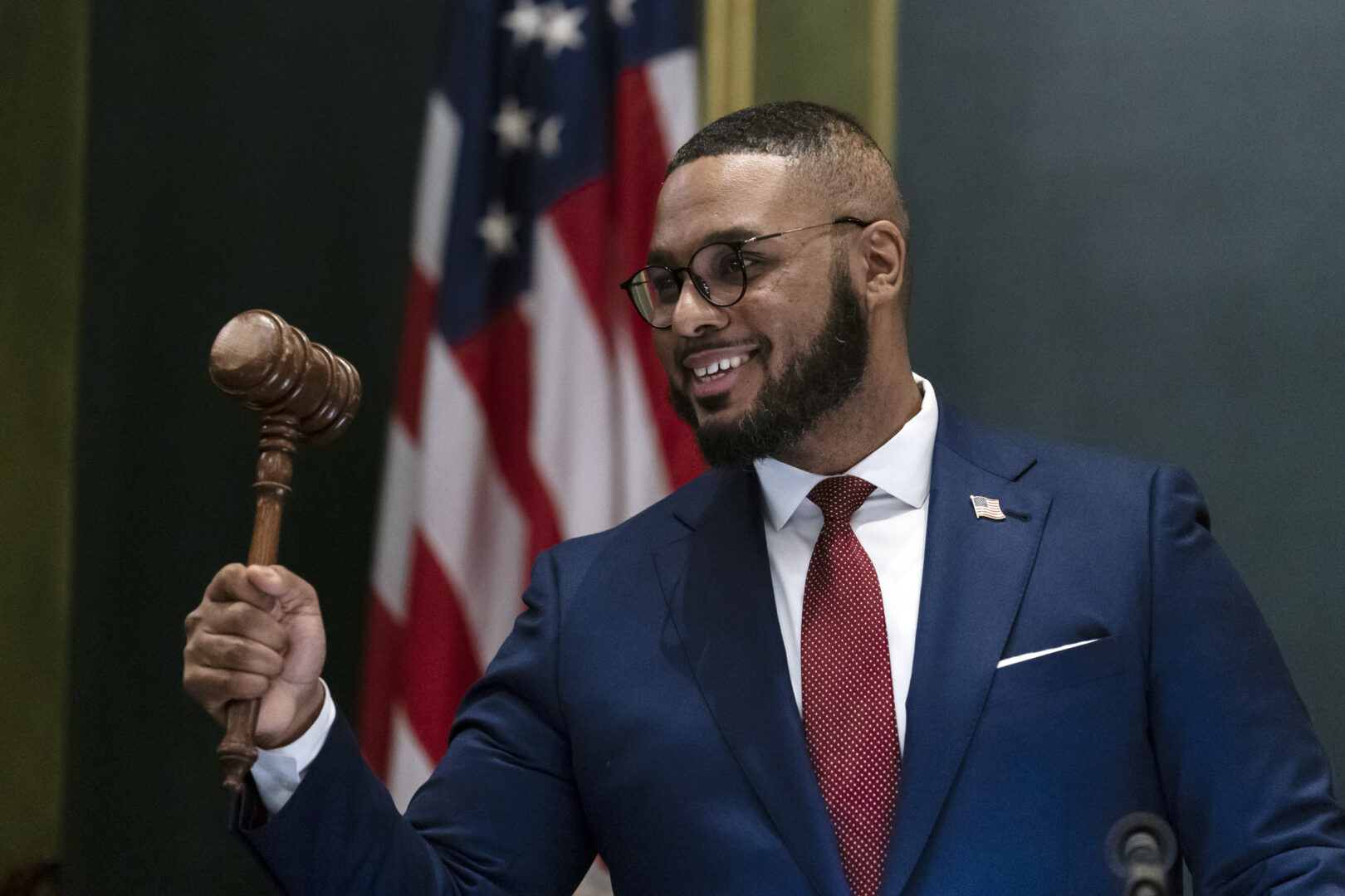 Democratic Lt. Gov. Austin Davis holds up the Senate gavel after becoming Pennsylvania's first Black lieutenant governor, Tuesday, Jan. 17, 2023, at the state Capitol in Harrisburg, Pa. (AP Photo/Matt Rourke)