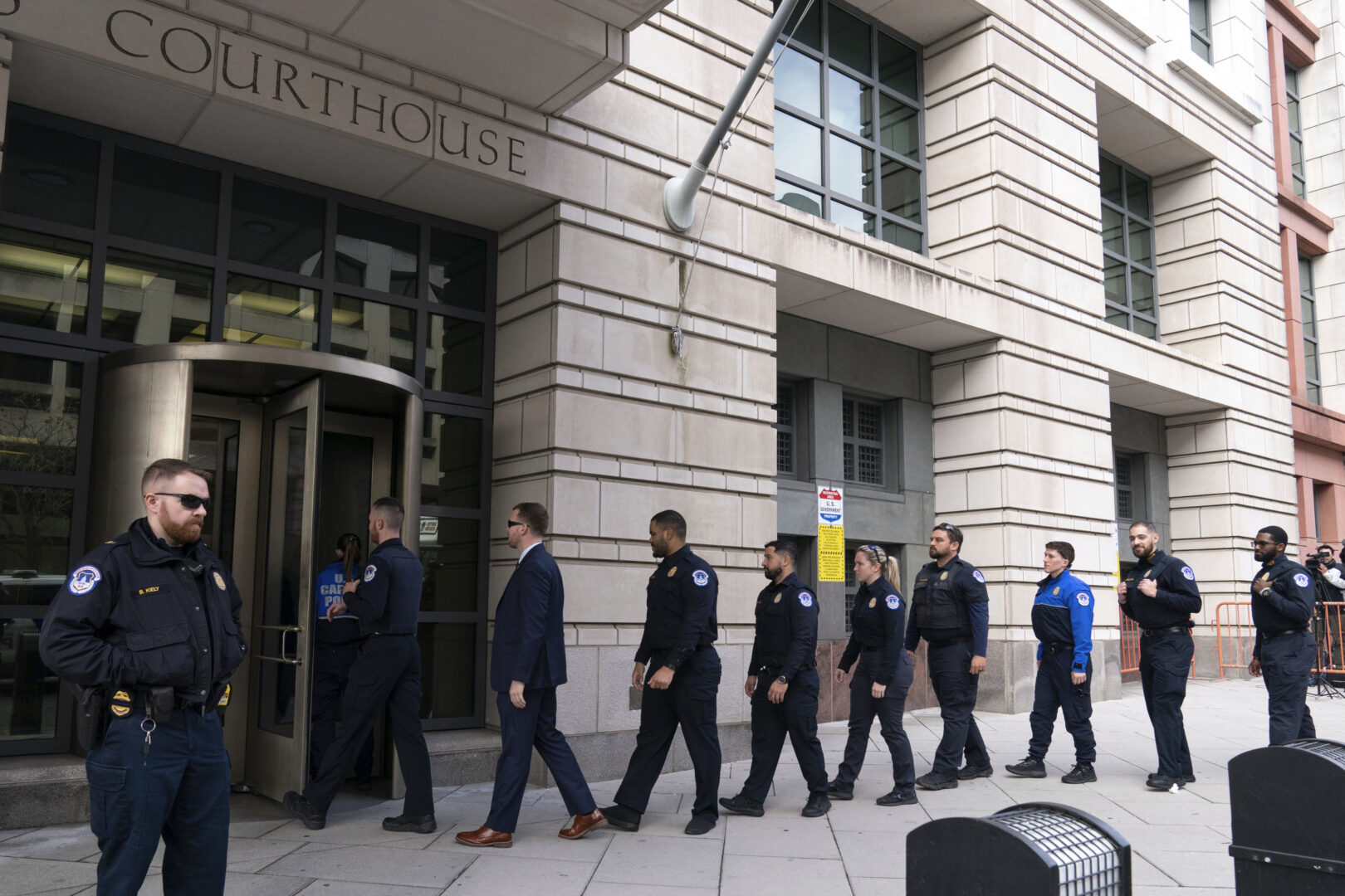 U.S. Capitol police officers arrive for the sentencing of Julian Khater and George Tanios, at the federal courthouse in Washington, Friday, Jan. 27, 2023. Both men joined the mob that stormed the Capitol on Jan. 6, 2021. Justice Department prosecutors had recommended a prison sentence of seven years and six months for Khater, 34, a former business owner in State College. Tanios pleaded guilty in July to two misdemeanors.