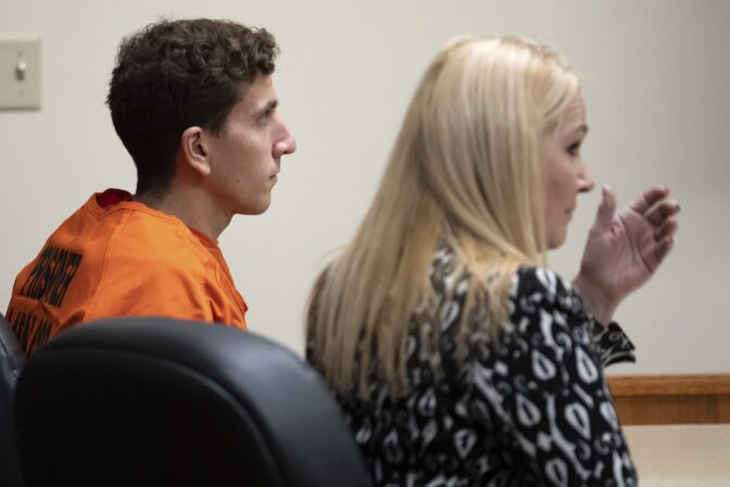 Bryan Kohberger, left, who is accused of killing four University of Idaho students in November 2022, sits with his attorney, public defender Anne Taylor, right, during a hearing in Latah County District Court, Thursday, Jan. 5, 2023, in Moscow, Idaho.