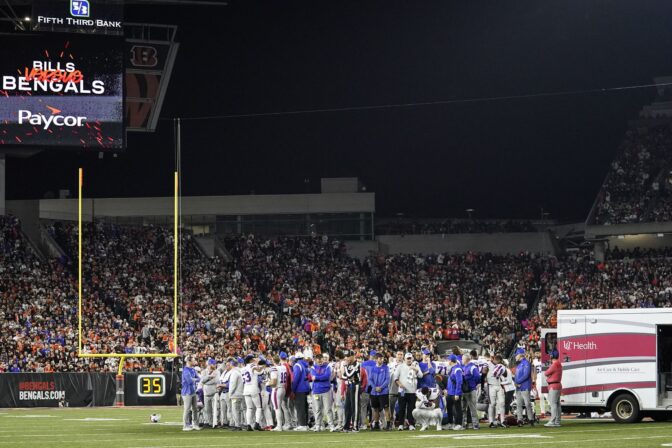 The Buffalo Bills players pray for teammate Damar Hamlin during the first half of an NFL football game against the Cincinnati Bengals, Monday, Jan. 2, 2023, in Cincinnati. The game has been postponed after Buffalo Bills' Damar Hamlin collapsed, NFL Commissioner Roger Goodell announced.