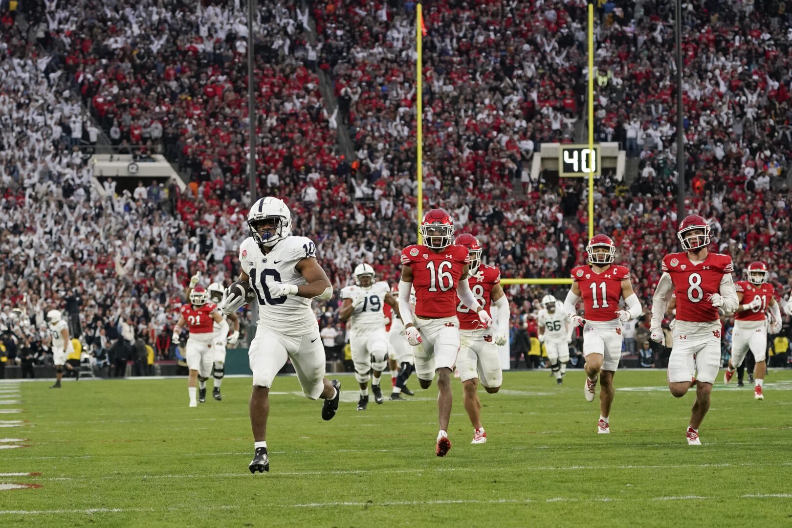 Penn State running back Nicholas Singleton (10) runs toward the end zone for a touch down during the second half in the Rose Bowl NCAA college football game against Utah Monday, Jan. 2, 2023, in Pasadena, Calif. 