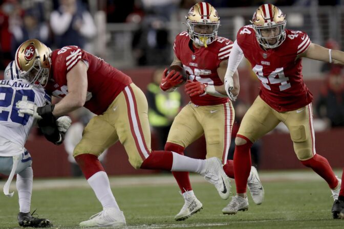 San Francisco 49ers running back Elijah Mitchell (25) runs during an NFL divisional round playoff football game against the Dallas Cowboys, Sunday, Jan. 22, 2023, in Santa Clara, Calif.