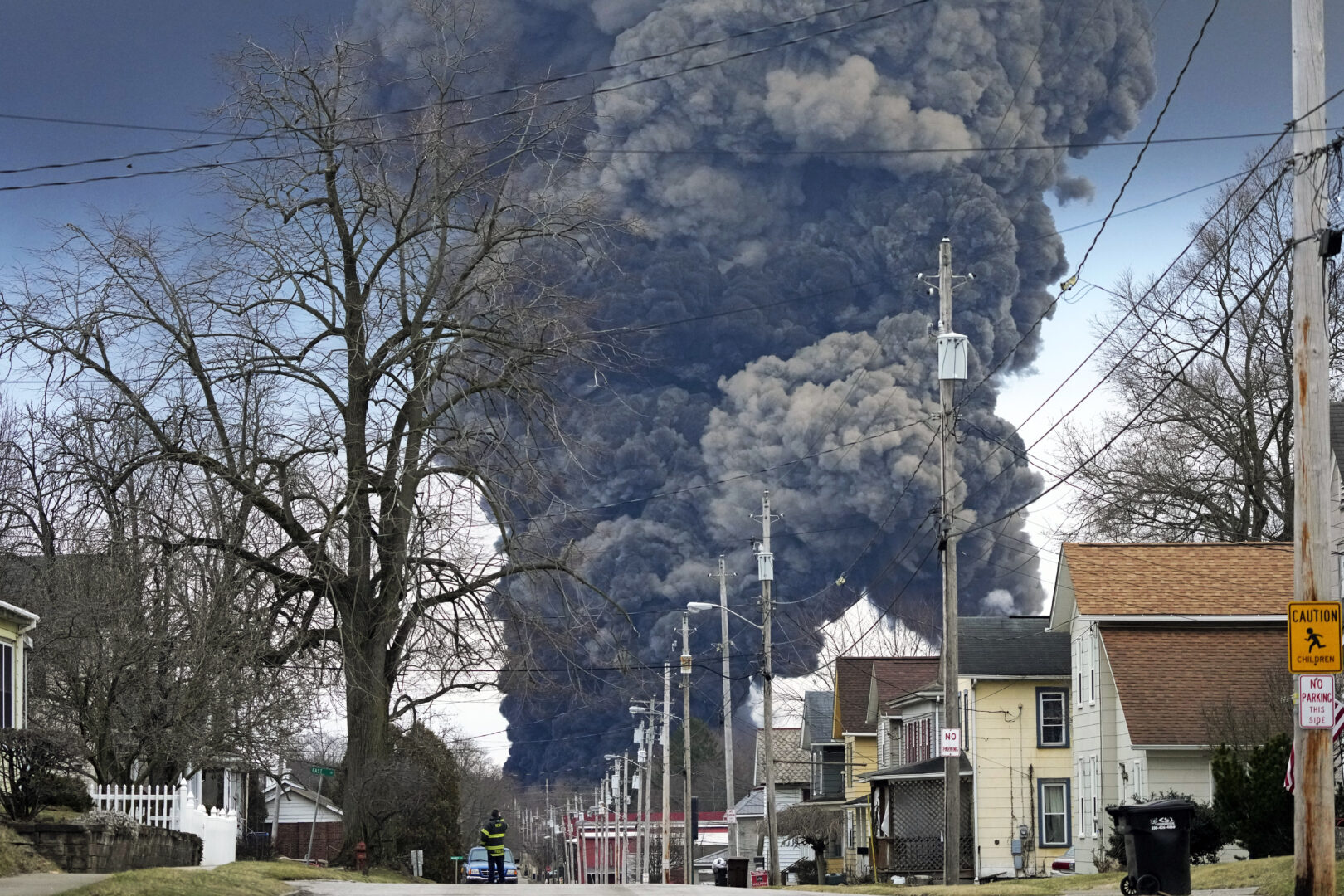 A black plume rises over East Palestine, Ohio, as a result of the controlled detonation of a portion of the derailed Norfolk and Southern trains Monday, Feb. 6, 2023. 