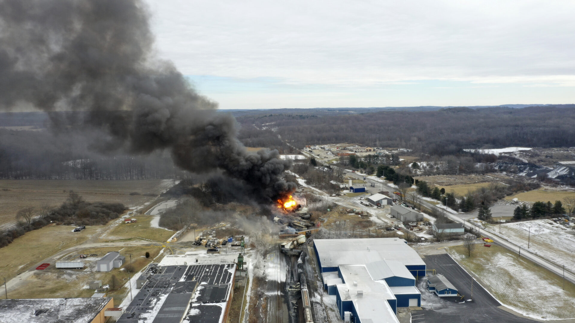 FILE - A plume rises from a Norfolk Southern freight train that derailed in East Palestine, Ohio, Feb. 4, 2023. After the catastrophic train car derailment in East Palestine, Ohio, some officials are raising concerns about a type of toxic substance that tends to stay in the environment. 