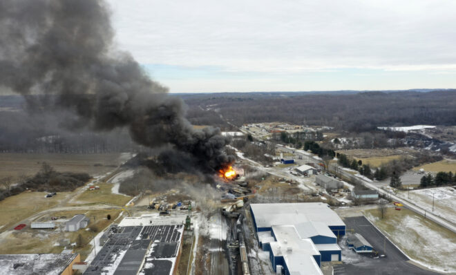 FILE - A plume rises from a Norfolk Southern freight train that derailed in East Palestine, Ohio, Feb. 4, 2023. After the catastrophic train car derailment in East Palestine, Ohio, some officials are raising concerns about a type of toxic substance that tends to stay in the environment. 