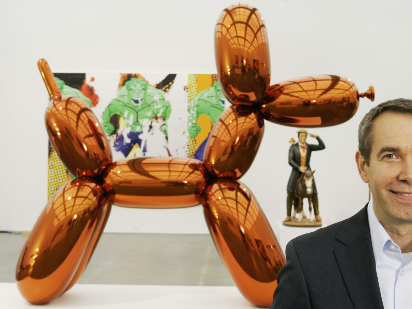 FILE - In this Thursday, May 29, 2008 file photo, artist Jeff Koons poses beside one of his works, 