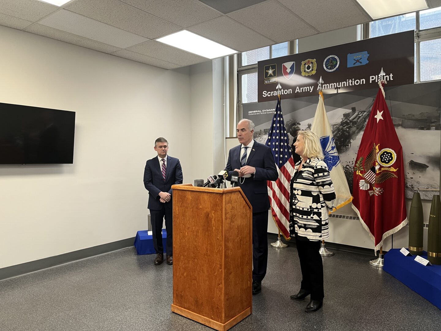 U.S. Senator Bob Casey, center, speaks alongside the 25th Secretary of the Army Christine Wormuth, right, at the Scranton Ammunition Plant on Feb. 6. Douglas R. Bush, U.S. Assistant Secretary of the Army for Acquisition, Logistics and Technology, stands at left. 