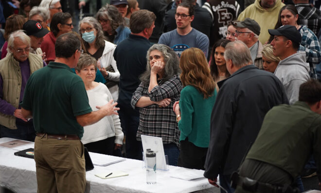 Community members attend a meeting at East Palestine High School on Wednesday, Feb. 15, 2023. Norfolk Southern did not attend the meeting, citing concerns of a growing physical threat to employees. Now, residents are turning to lawyers to get answers they say they can't get from the company.
