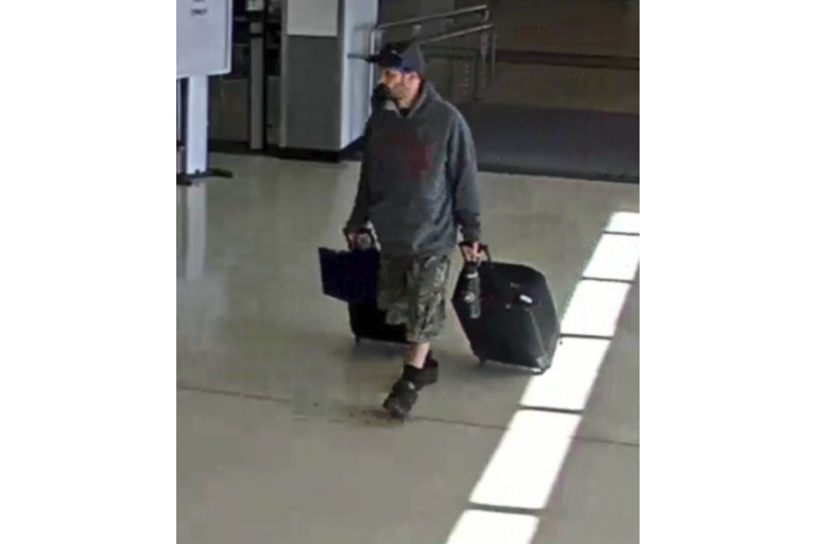 This airport surveillance camera image released in an FBI affidavit shows alleged suspect Marc Muffley at Lehigh Valley International Airport in Allenstown, Pa., on Monday, Feb. 27, 2023. Muffley was arrested Monday after an explosive was found in a bag checked onto a Florida-bound flight, federal authorities said. 