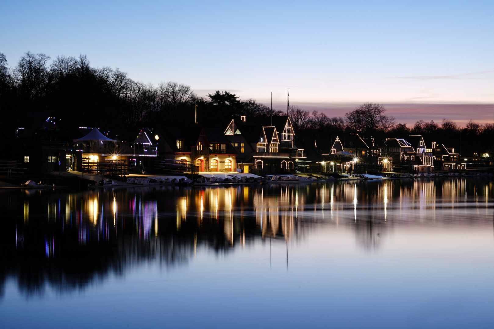 Lights illuminate the outline of structures on Boathouse Row along the banks of the Schuylkill River in Philadelphia, Thursday, March 16, 2023. (AP Photo/Matt Rourke)