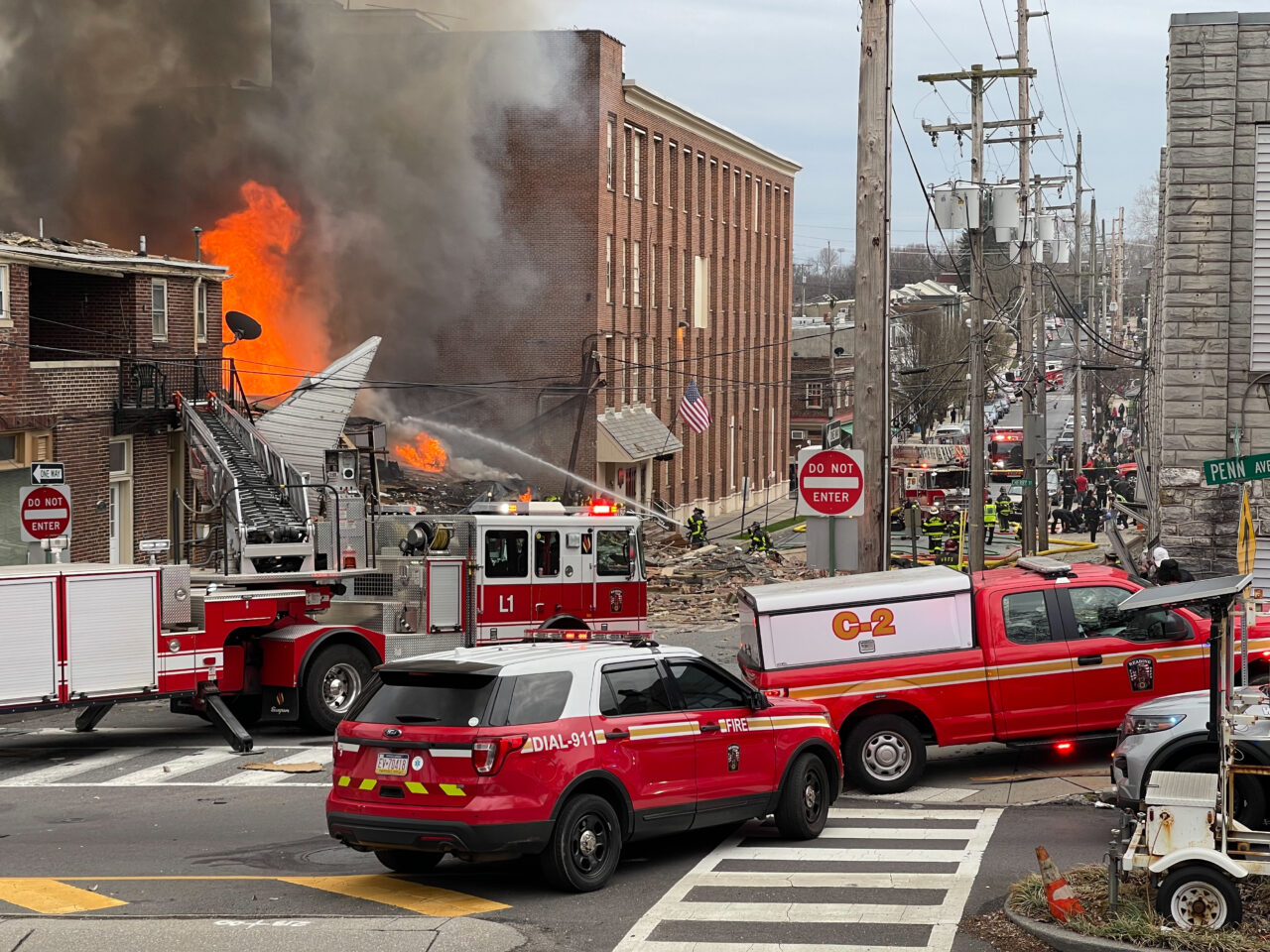 Emergency crews respond to R.M. Palmer Co. on March 24, 2023 after an explosion destroyed part of the candy factory.
