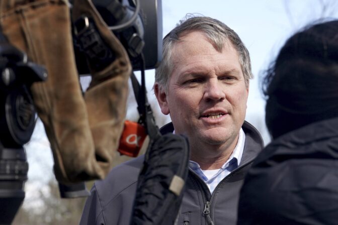 Norfolk Southern President and CEO Alan Shaw speaks to reporters, Feb. 21, 2023, near the site where a freight train derailed Feb. 3 in East Palestine, Ohio.