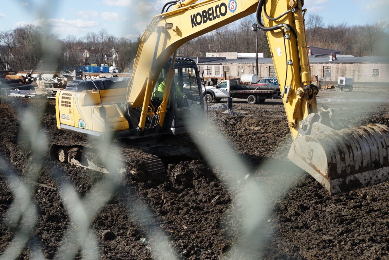 Heavy equipment moves dirt near the site of the derailment on Saturday,March 4, 2023.

