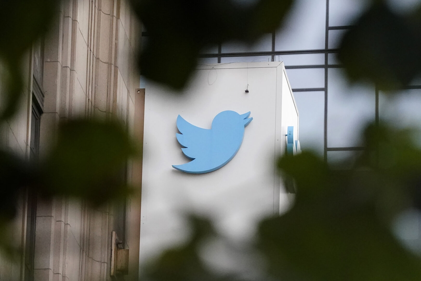 A sign at Twitter headquarters is shown in San Francisco, Dec. 8, 2022. Twitter's owner and CEO, Elon Musk, acknowledged the 'state-affiliated' tag applied to NPR after he posted a screenshot of Twitter's definition of 'state-affiliated media' with a short message on Apr. 5, 2023: 