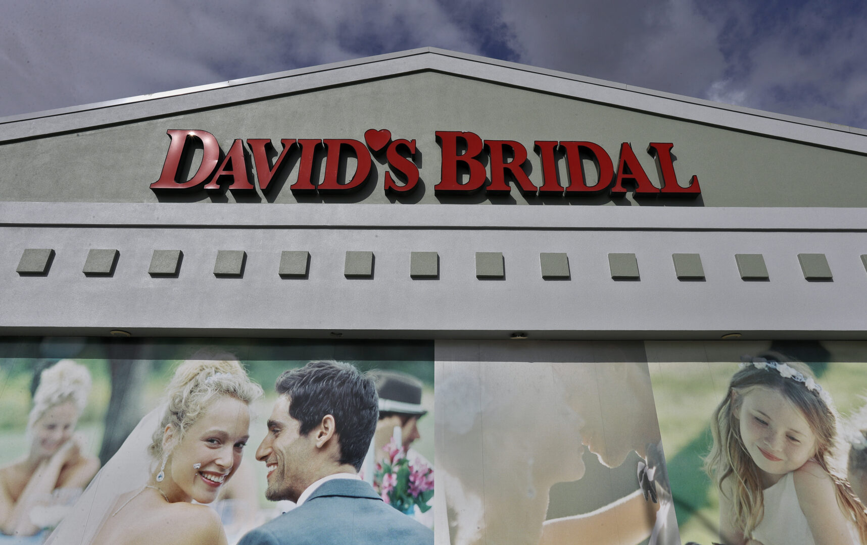 FILE - The David's Bridal shop is shown Nov. 19, 2018, in Tampa, Fla. David’s Bridal filed for bankruptcy protection Monday, April 17, 2023 the second time that the firm has sought such protection in the last five years. The announcement came just days after the company, one of the largest sellers of wedding gowns and formal wear, said it could be eliminating 9,236 positions across the United States. The Conshohocken, Pennsylvania-based retailer employs more than 11,000 workers, (AP Photo/Chris O'Meara, file)