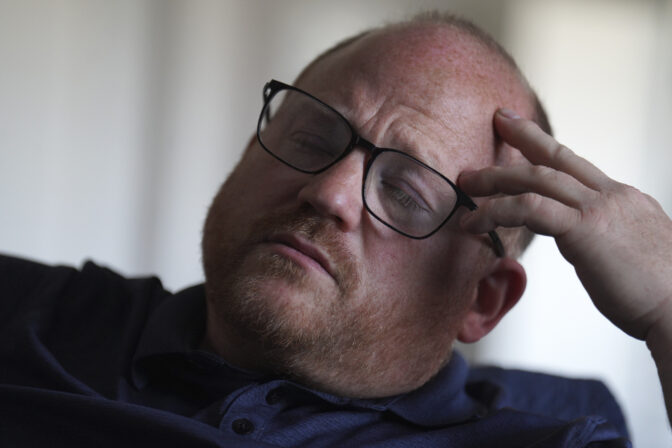 Former Jehovah's Witnesses elder and father of a sexual abuse victim, Martin Haugh, gives an interview at his home in York Haven, Pa.