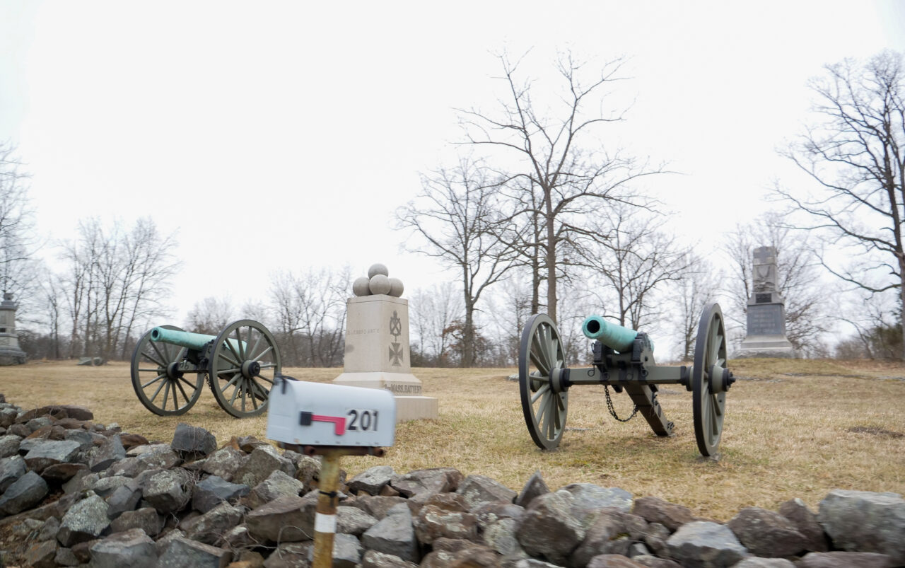 Arriving at the Althoff House on the Gettysburg Battlefield people are greeted by canons an a monument for the 3rd Massachuetts Battery