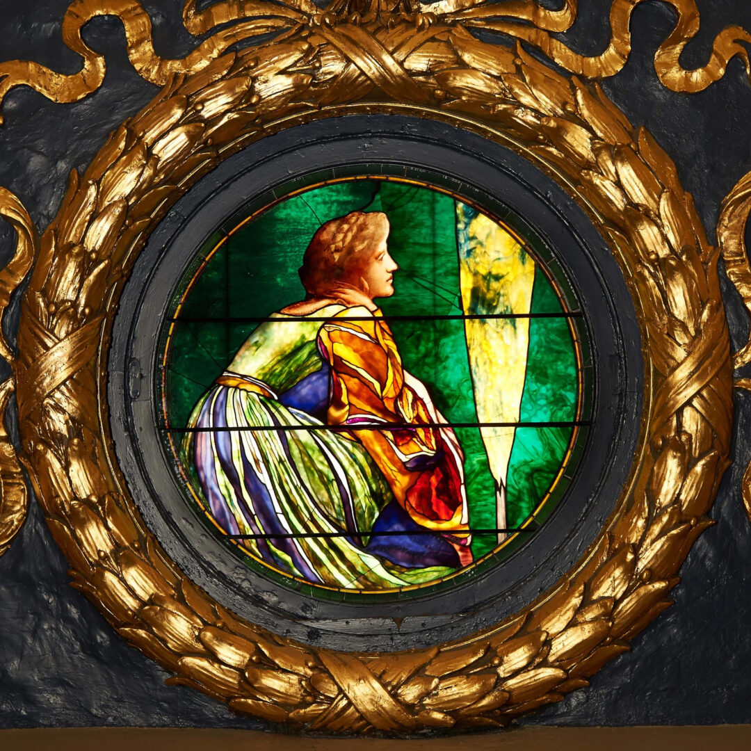 A stained glass window personifying Pennsylvania's natural gas industry in the Pennsylvania House Chamber. The window is one of 24 designed by artist William Brantly Van Ingen.