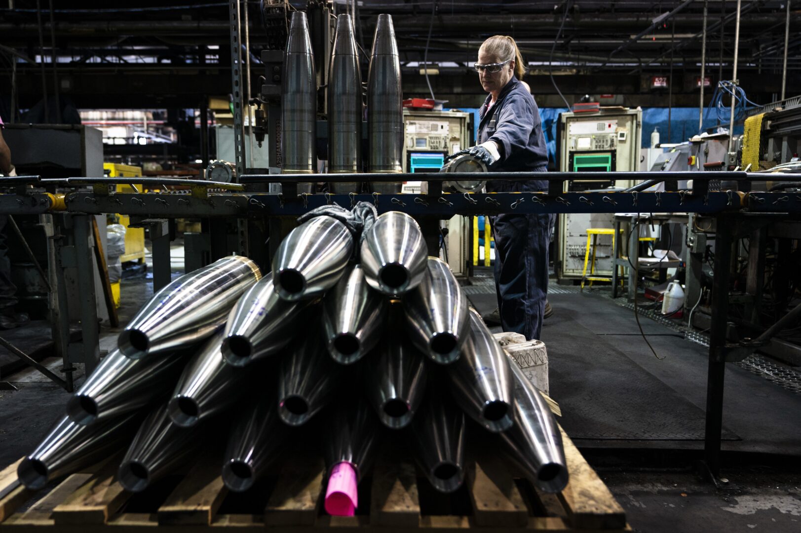 A steel worker moves a 155 mm M795 artillery projectile during the manufacturing process at the Scranton Army Ammunition Plant in Scranton, Pa., Thursday, April 13, 2023. One of the most important munitions of the Ukraine war comes from a historic factory in this city built by coal barons, where tons of steel rods are brought in by train to be forged into the artillery shells Kyiv can’t get enough of — and that the U.S. can’t produce fast enough. 