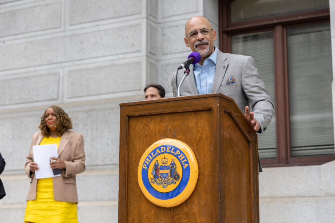 Pa. State Representative Chris Rabb joined other officials and advocates promoting green legislation at at Penn Environment’s press conference that called out Pa.’s top polluters at City Hall in Philadelphia on May 8, 2023. (Kimberly Paynter/WHYY)