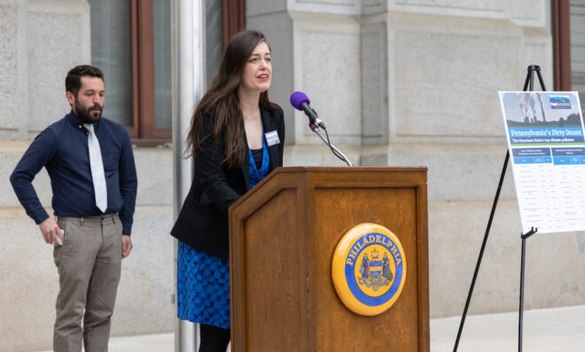Stephanie Wein, a Clean Water &amp; Conservation Advocate with Penn Environment, talked about green legislation that Pa. residents can support like the Regional GreenhouseGas Initiative, at a press press conference calling out Pa.’s top polluters at City Hall in Philadelphia on May 9, 2023. (Kimberly Paynter/WHYY)