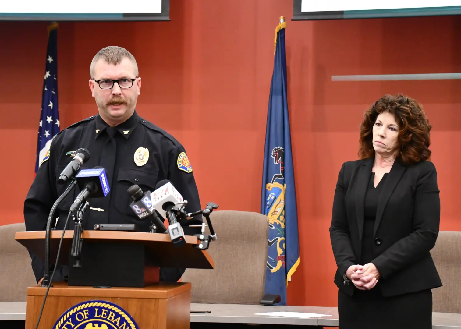 Lebanon City Police Chief Bret Fisher, left, and Lebanon City Mayor Sherry Capello release details of a triple homicide that took place Tuesday night where an 8-year-old, 9-year-old and 19-year-old were killed. 
