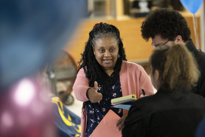Learning Support Teacher Susannah Campbell speaks with prospective applicants during William Penn School District's teachers job fair at the high school's cafeteria in Lansdowne, Pa., Wednesday, May 3, 2023.