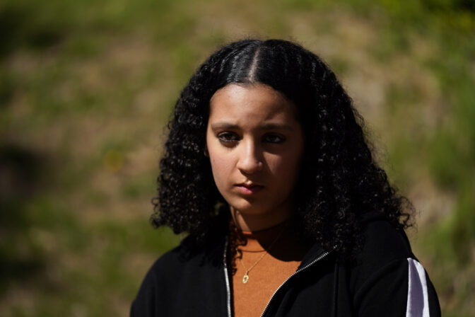 Upper Darby High School student Fatima Afrani, 15, pauses while speaking with a reporter during an interview