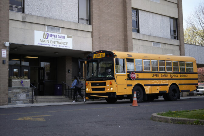 A student arrives for class at Upper Darby High School, 