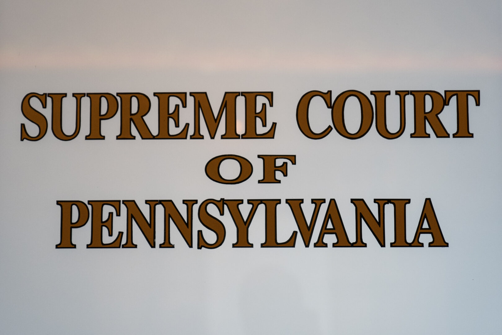 The Supreme Court of Pennsylvania is labeled on a door at the Capitol in Harrisburg, Pa., Tuesday, Feb. 21, 2023.  (AP Photo/Matt Rourke, File)