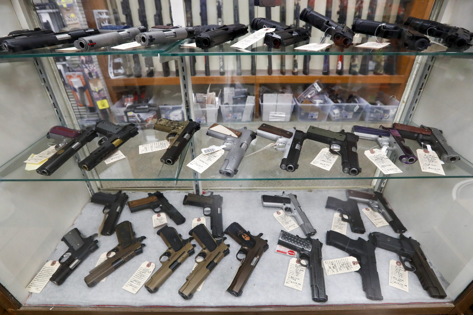  Semi-automatic handguns are displayed at shop in New Castle, Pa., March 25, 2020.   (AP Photo/Keith Srakocic, File)