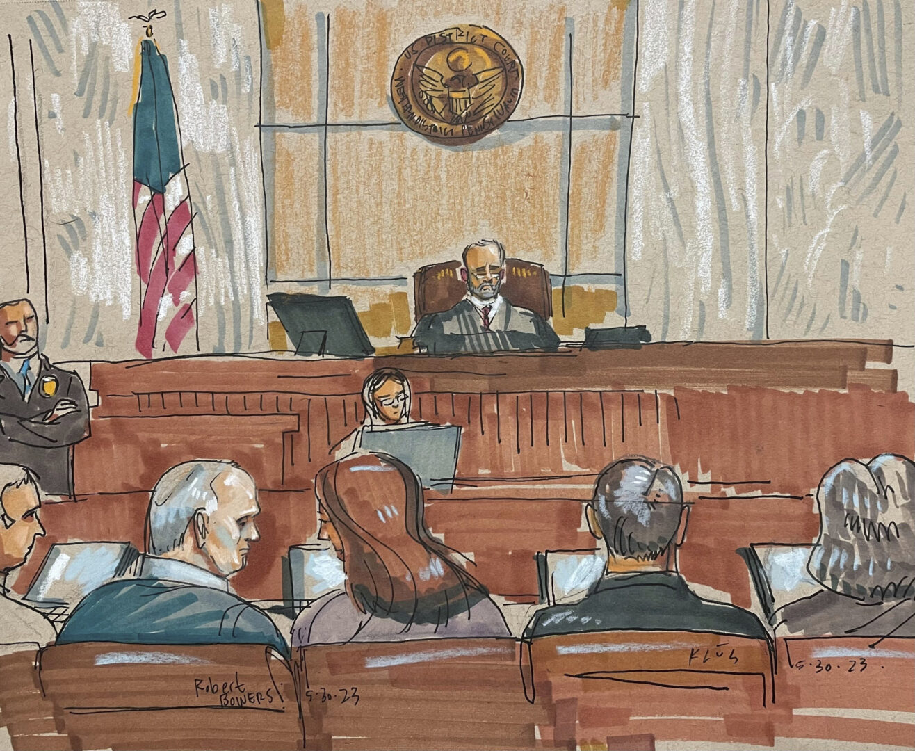 In this courtroom sketch, Robert Bowers, the suspect in the 2018 synagogue massacre, confers with his legal team on Tuesday, May 30, 2023, in Pittsburgh.  (David Klug via AP)
