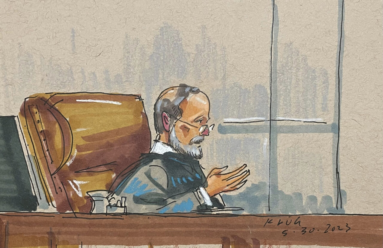 In this courtroom sketch, Judge Robert Colville presides over the federal trial for Robert Bowers, the suspect in the 2018 synagogue massacre, on Tuesday, May 30, 2023,