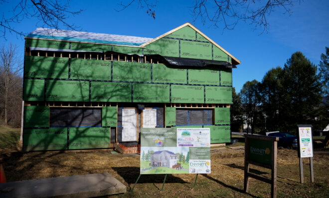 The State College Community Land Trust and Envinity are working to make a home in State College more energy efficient. They built an "envelope" around the exterior of the home that will be filled with insulation. (Jeremy Long - WITF)