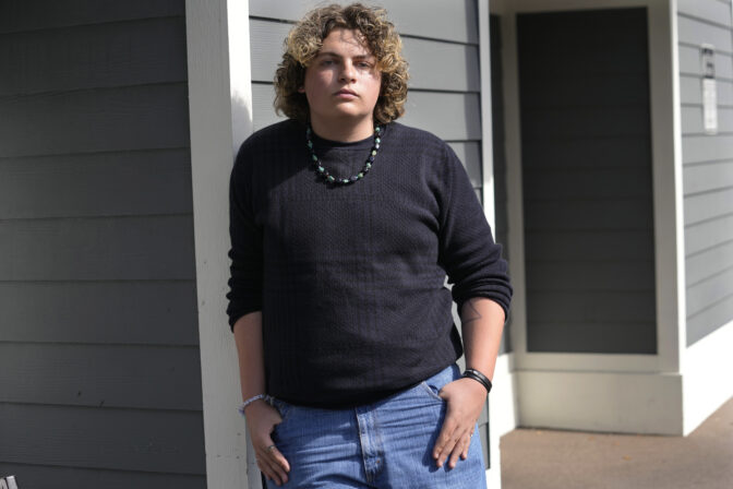 Jack Fitzgerald, a senior at J.P. Taravella High School who started the school's the Gender and Sexuality Alliance club, stands for a portrait in Lauderhill, Fla., on Wednesday, April 19, 2023. Last year, as a junior, he led a school walkout to protest a new law that banned instruction on sexual orientation and gender identity for kindergarten to third grade. The law, part of the anti-LGBTQ+ legislation pushed by DeSantis, was dubbed “Don’t Say Gay” by critics and recently expanded to encompass all grades. Jack was surprised by two things. Most students initially knew little about the bill. And once they learned about it, support for the walkout was overwhelming.