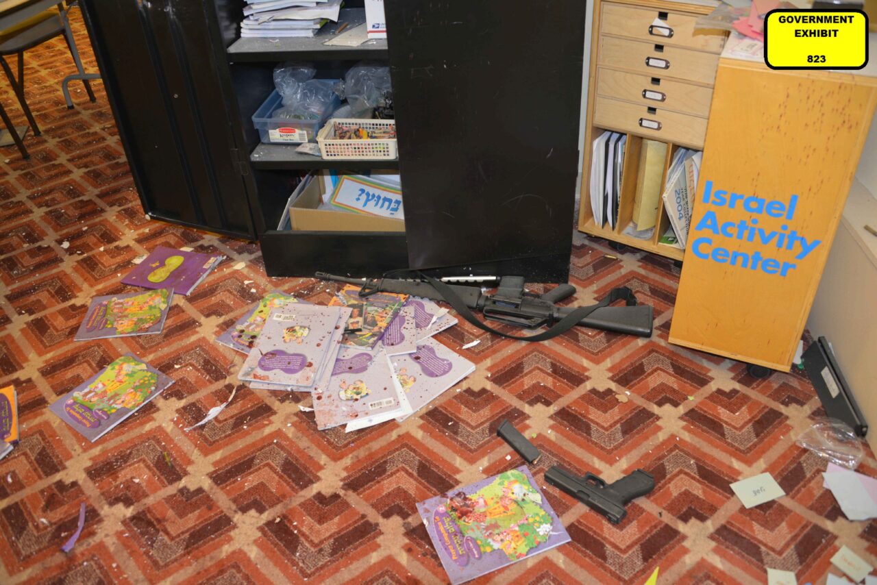 Firearms lie on the floor of the classroom where the police shootout with Robert Bowers took place.