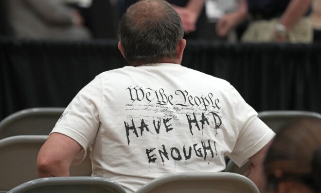 East Palestine, Ohio resident Eric Cozza attends the National Transportation Safety Board investigative hearing at the East Palestine High School in East Palestine, Ohio, Thursday, June 22, 2023.