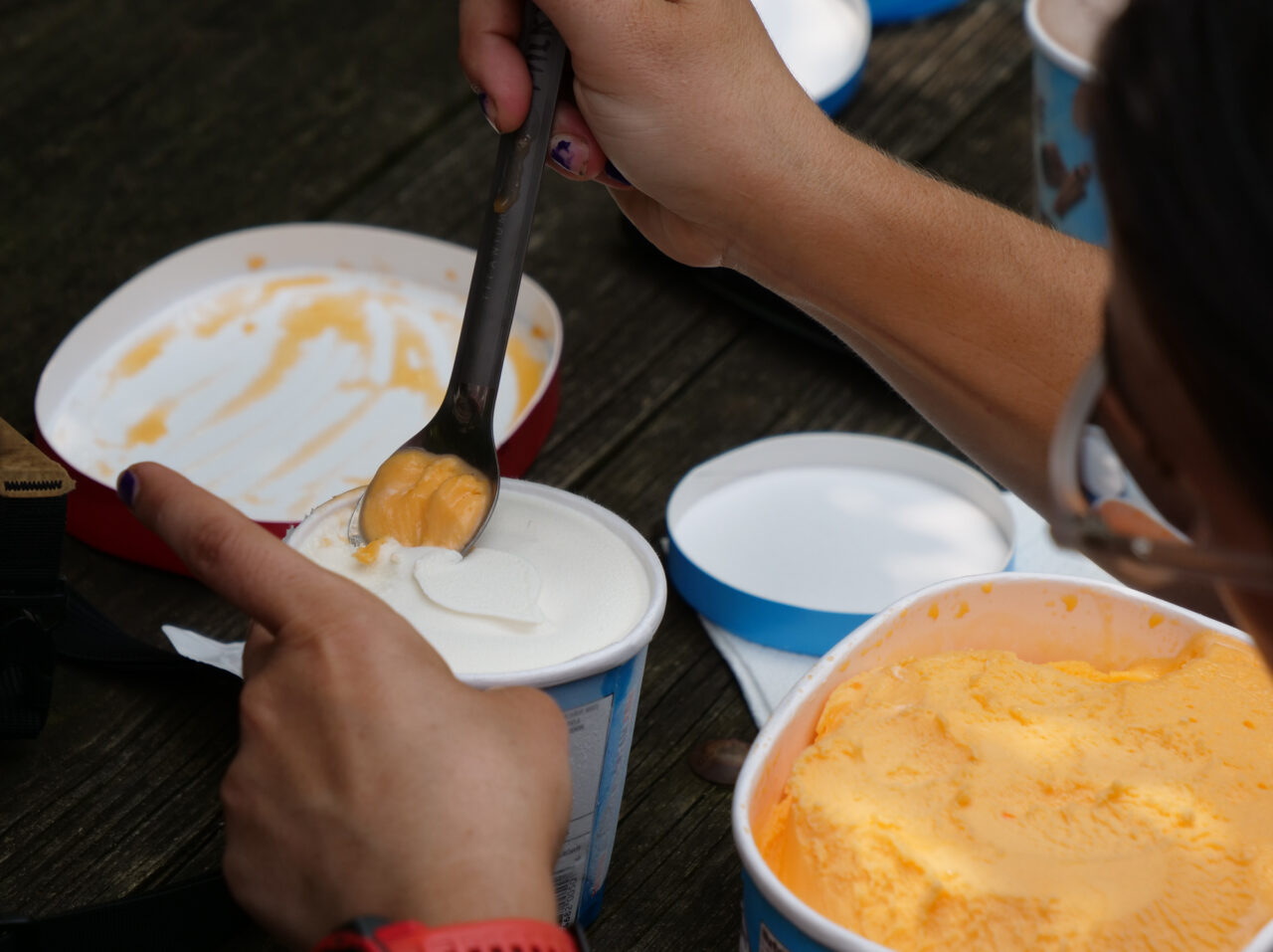 Yvette "Milkweed" Furnia, 36, of Orange County, New York mixes up a creamsicle for the half gallon challenge at the Pine Grove Furnace store on Tuesday, July 18, 2023.