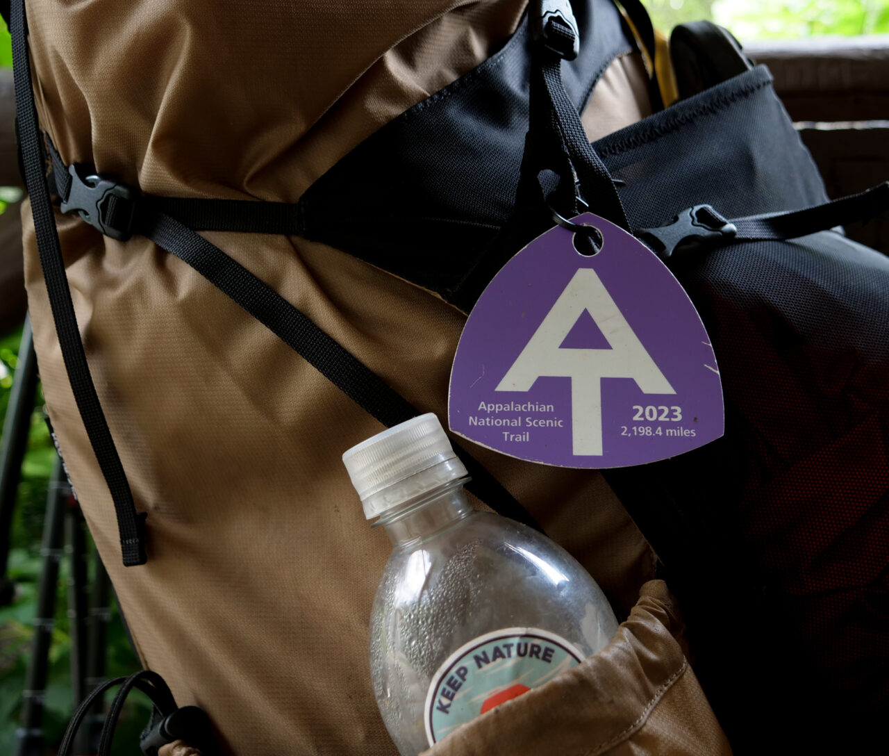 Austin "Fun Facts" Miller, 27, of Omaha, Nebraska displays his trail tag on his pack, seen at the Pine Grove Furnace store on Tuesday, July 18, 2023.