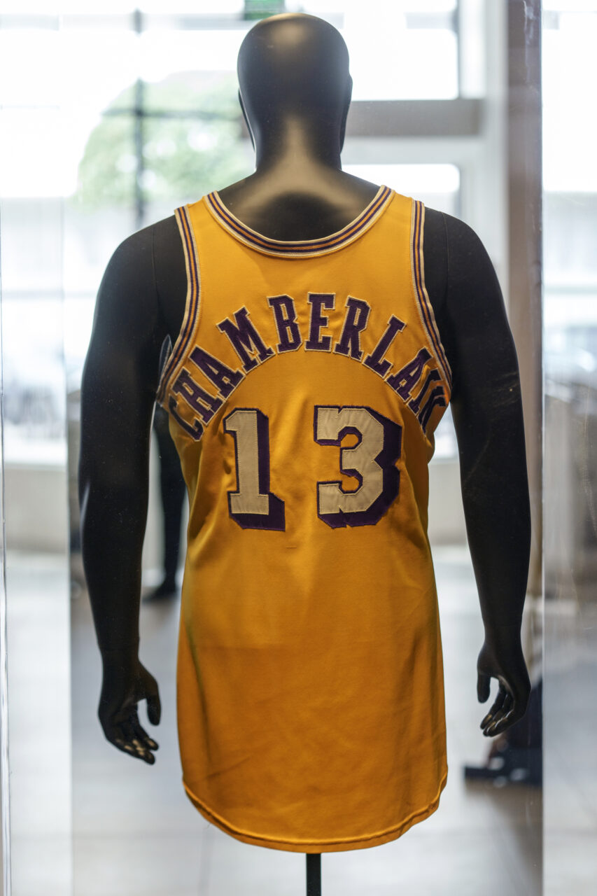The back of Wilt Chamberlain's 1972 NBA Finals 'Championship Clinching' Jersey, from is previewed at Sotheby's Los Angeles Gallery on Tuesday, Aug. 1, 2023, in Beverly Hills, Calif. The jersey is being offered along with a collection of memorabilia in an online sale Aug. 28-Sept. 27. (AP Photo/Damian Dovarganes)