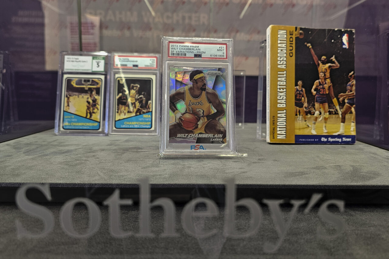 A collection of Wilt Chamberlain memorabilia from Wilt Chamberlain's 1972 NBA Finals including trading cards, magazines, newspapers and photographs are previewed at Sotheby's Los Angeles Gallery on Tuesday, Aug. 1, 2023, in Beverly Hills, Calif. Chamberlain's 1972 NBA Finals jersey along with a collection of memorabilia will be offered in an online sale Aug. 28-Sept. 27. (AP Photo/Damian Dovarganes)